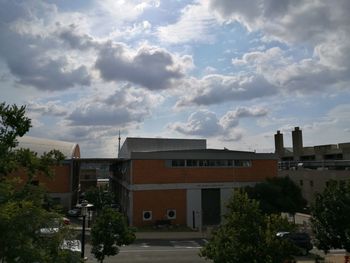 Houses against sky in city