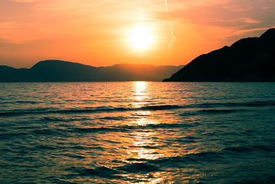 Scenic view of sea against sky during sunset