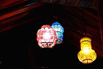 Low angle view of illuminated pendant light