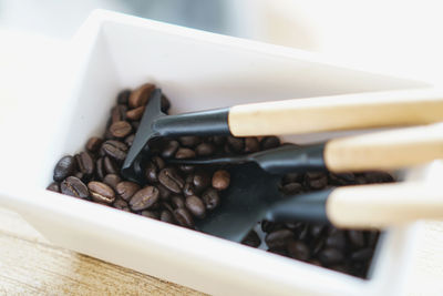 Close-up of coffee beans on table