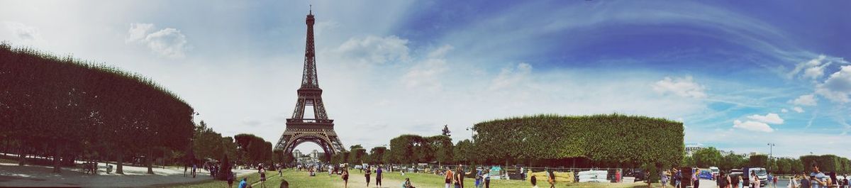 Panoramic shot of champ de mars by eiffel tower against sky