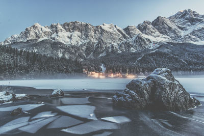 Scenic view of snowcapped mountains against sky