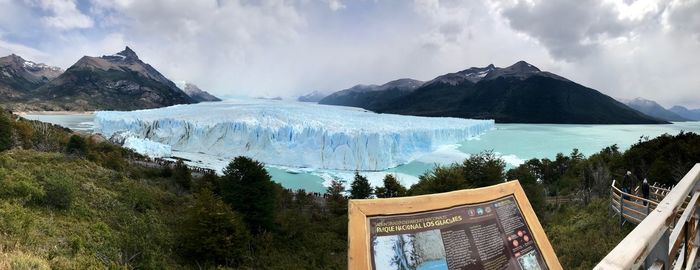 Panoramic view of snowcapped mountains against sky