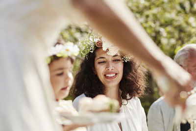 Portrait of a smiling young woman outdoors