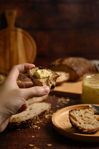 Close-up of hand holding food