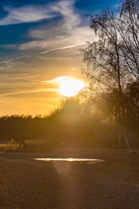 Scenic view of lake during sunset