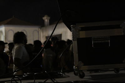 People playing guitar at night