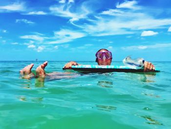 Person swimming in sea