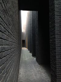 Empty alley amidst buildings