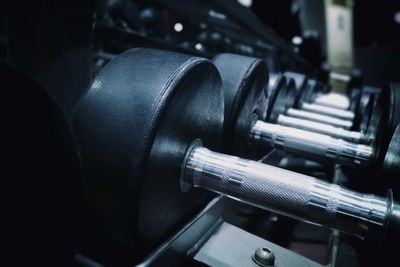 Close-up of dumbbells in gym