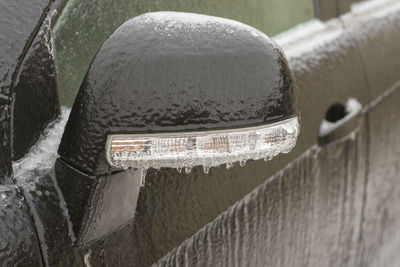 Close-up of snow on metal railing