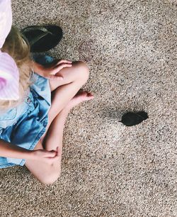 Low section of woman on beach