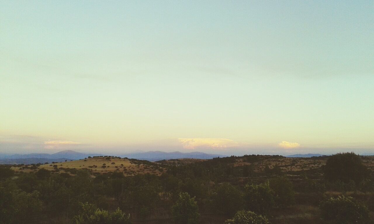 tranquil scene, tranquility, scenics, beauty in nature, landscape, sky, mountain, nature, copy space, idyllic, non-urban scene, remote, outdoors, sunset, tree, clear sky, hill, no people, non urban scene, horizon over land