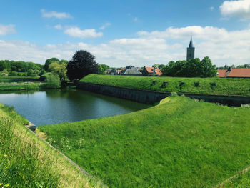 Scenic view of river against sky