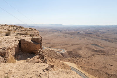 Scenic view of desert against clear sky