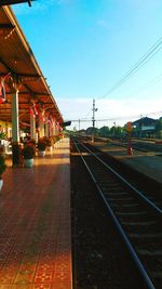 Railroad tracks against clear sky