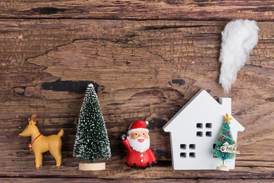 High angle view of christmas decorations on wooden table