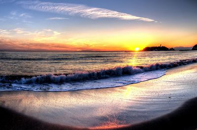 Scenic view of sea at sunset