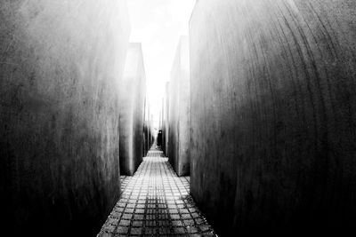 Rear view of woman walking on walkway