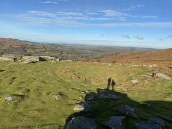 Scenic view of land against sky