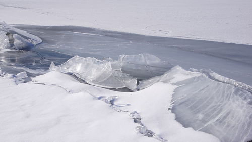 High angle view of snowcapped mountains during winter