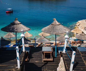 High angle view of chairs on beach