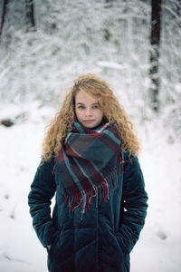 Portrait of woman in snow