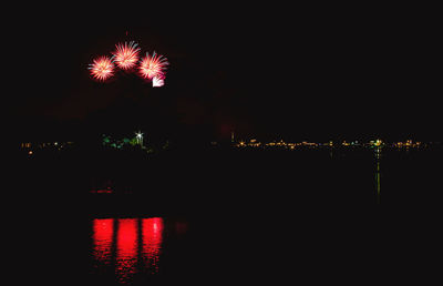 Firework display at night