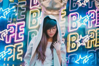 Full length of young woman with text