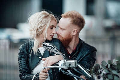 Young couple kissing outdoors