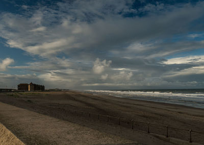 Scenic view of beach against sky