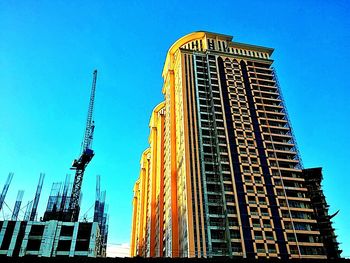 Low angle view of modern building against clear sky