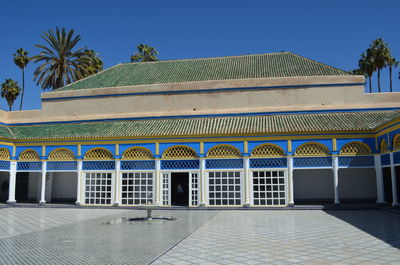 Low angle view of building against blue sky