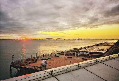 High angle view of sea against sky during sunset