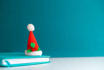 Close-up of cake on table against blue background