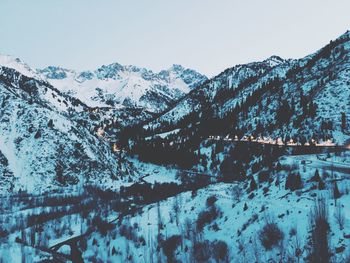 Scenic view of snow covered mountains