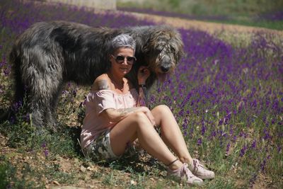 Woman sitting on field