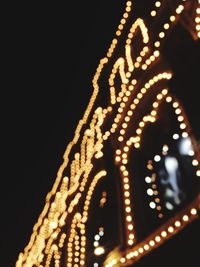 Low angle view of illuminated building