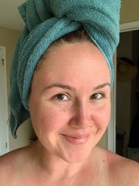 Portrait of smiling woman at home