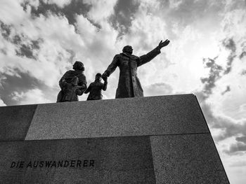 Low angle view of statue against sky