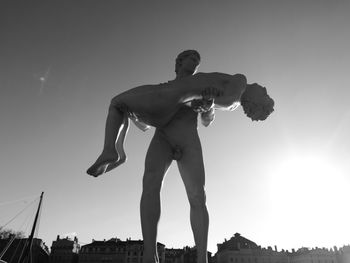 Low angle view of man against sky