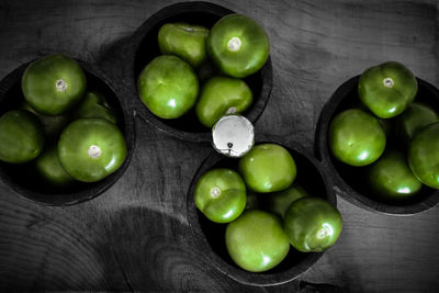 High angle view of green fruits on table