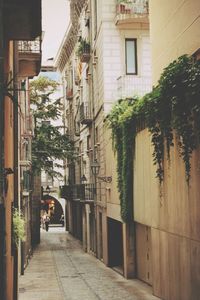 Narrow alley with buildings in background