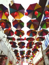 Low angle view of decoration hanging on building