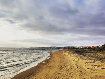 Scenic view of beach against sky