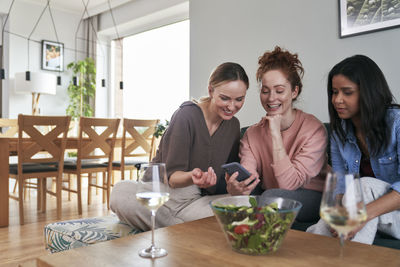 Portrait of business colleagues working on table