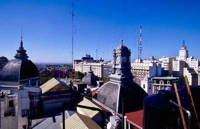 Roofs, plaza de mayo and casa rosada in the background, river plate in the far background