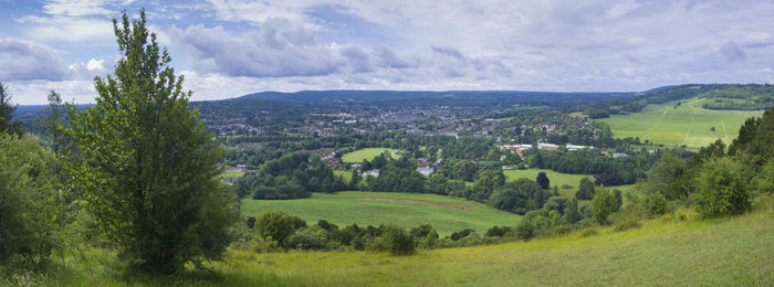 Scenic view of agricultural field against sky