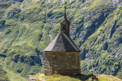 Old chapel against mountain