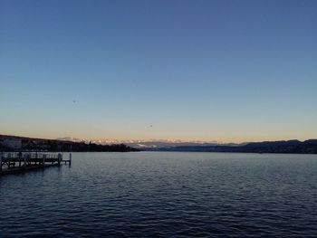 Scenic view of calm sea against clear sky